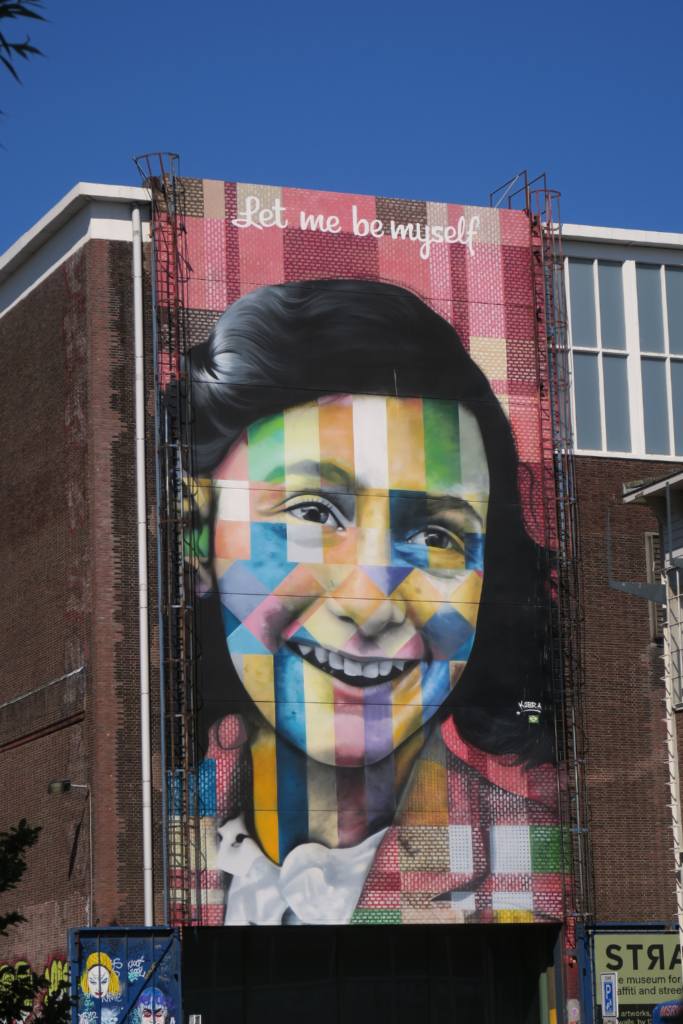 Anne Frank's portrait on Straat's museum building, at NSDM, Amsterdam, The Netherlands